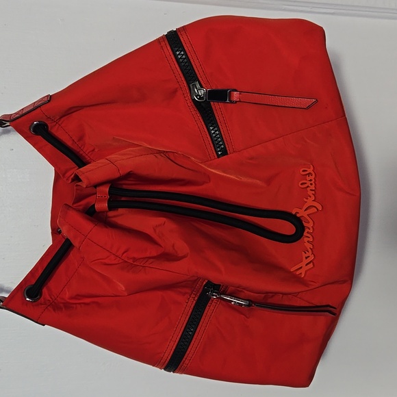 🏠 Henri Bendel Studio Nylon Drawstring Vibrant Red Bucket Bag